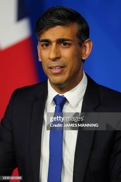 Britain's Prime Minister Rishi Sunak hosts a press conference inside the Downing Street Briefing Room, in central London, on December 7 after Britain...