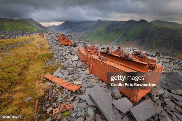 abandoned rusty slate wagons - dinorwic quarry stock pictures, royalty-free photos & images