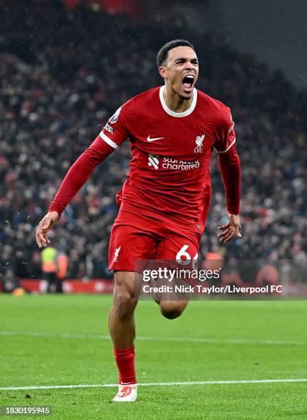 Trent Alexander-Arnold of Liverpool celebrates scoring Liverpool's fourth and match winning goal during the Premier League match between Liverpool FC...