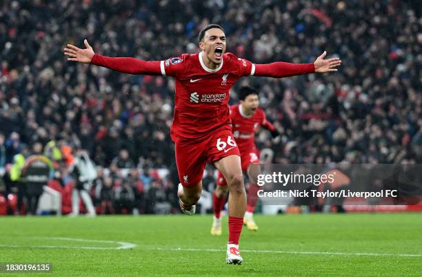Trent Alexander-Arnold of Liverpool celebrates scoring Liverpool's fourth and match winning goal during the Premier League match between Liverpool FC...