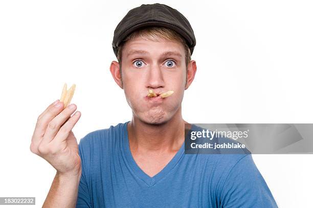 chomping away - french fries isolated stock pictures, royalty-free photos & images