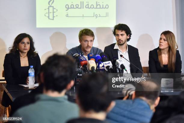 Video journalist Dylan Collins speaks during a joint Amnesty International and Human Rights Watch press conference in Beirut on December 7, 2023. The...