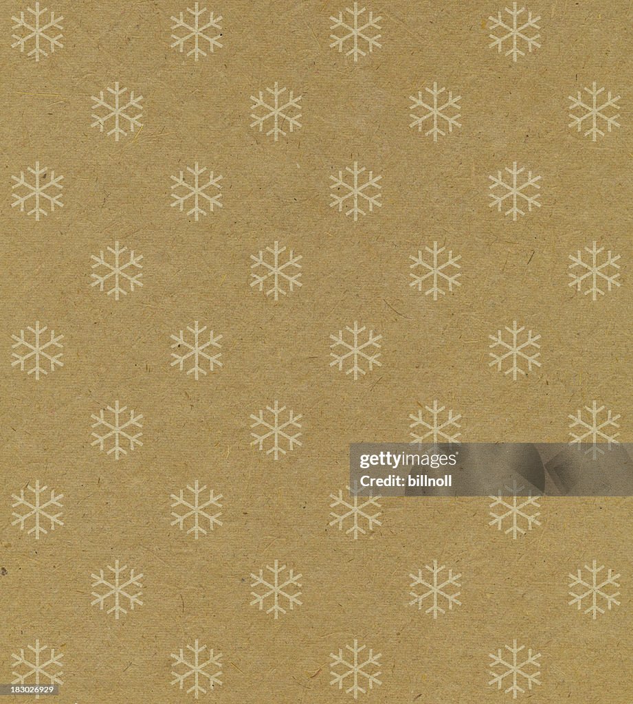 Recycled paper with snowflake pattern