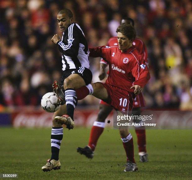 Juninho of Middlesbrough clashes with Kieron Dyer of Newcastle during the Middlesbrough v Newcastle United FA Barclaycard Premiership match at the...