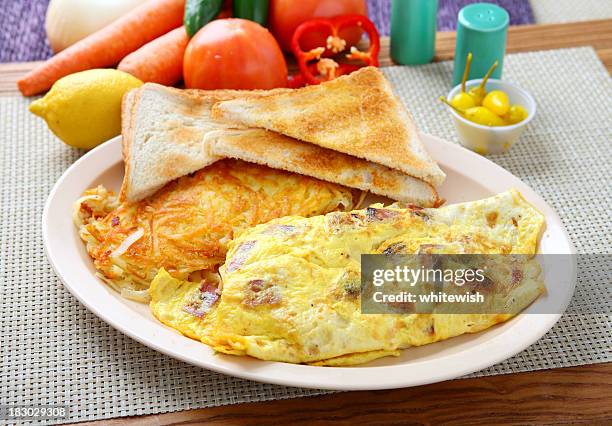 breakfast platter with omelette, toast and hash browns - omelette stock pictures, royalty-free photos & images