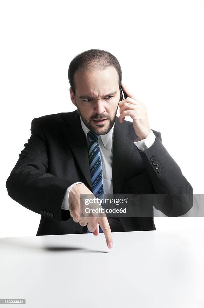 Angry businessman&#160;on the phone, demanding results