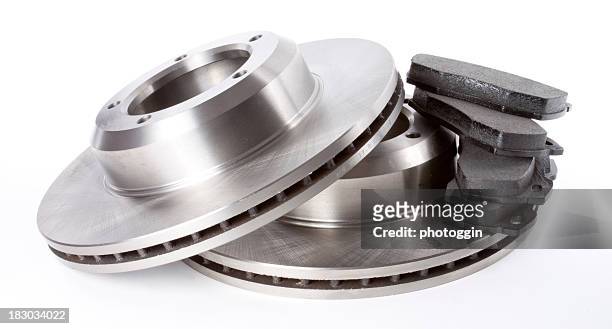brake discs and pads - part of stockfoto's en -beelden