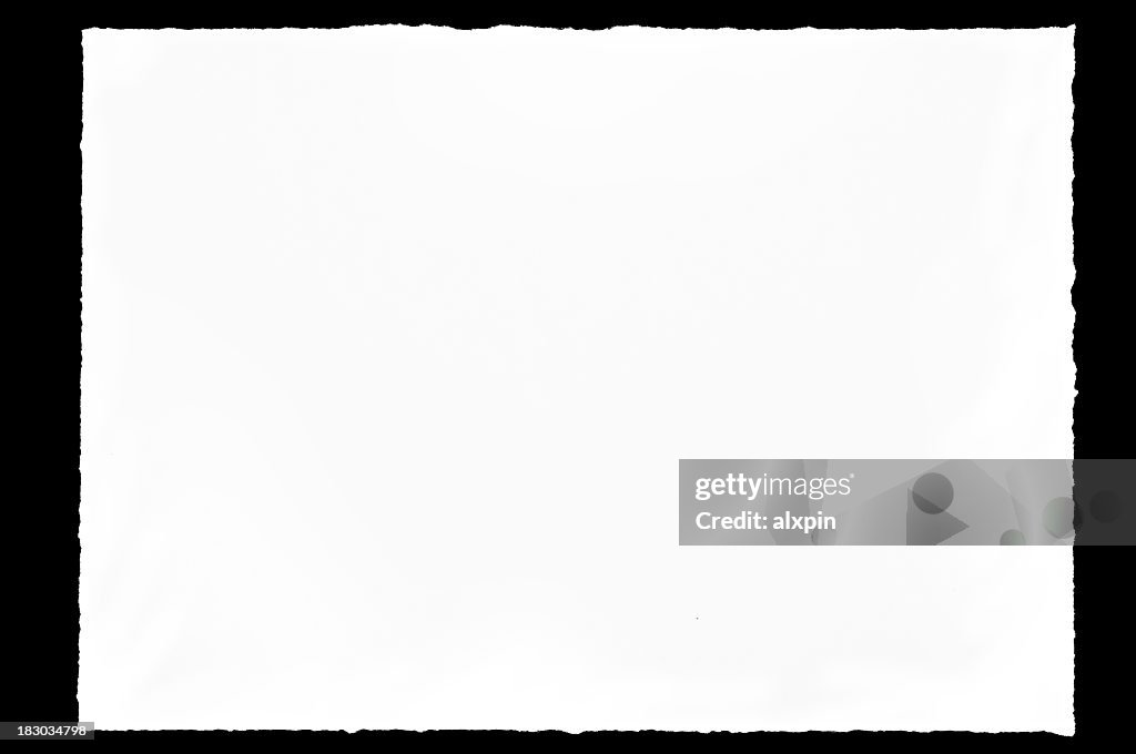 A blank page of paper with textured edges