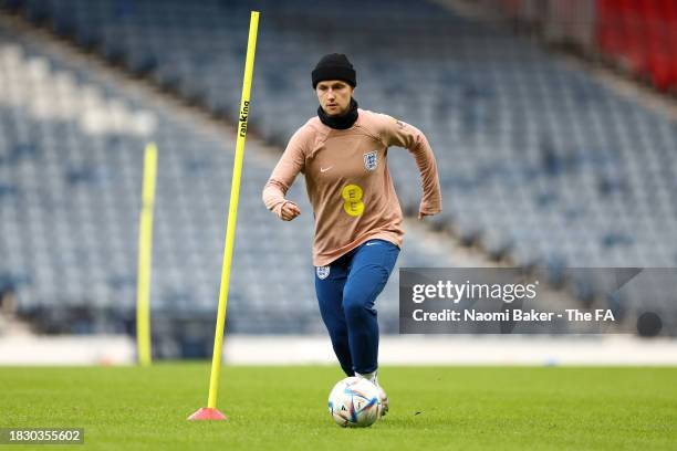 Lotte Wubben-Moy of England runs with the ball during a training session at Hampden Park on December 04, 2023 in Glasgow, Scotland.