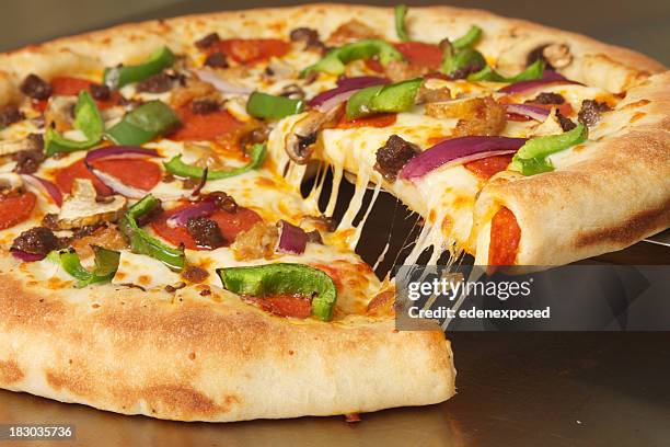 pizza with a stuffed crust - stuffing stock pictures, royalty-free photos & images