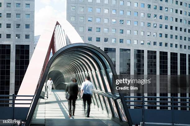 business people walking along an elevated walkway, la defense, paris - la defense bildbanksfoton och bilder