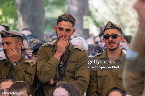 Soldiers, family and members of the public attend the funeral for Sgt. First Class Ben Zussman on December 04, 2023 in Jerusalem. This morning, the...
