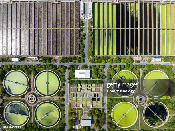 sewage treatment plant in city - mineral water stock pictures, royalty-free photos & images