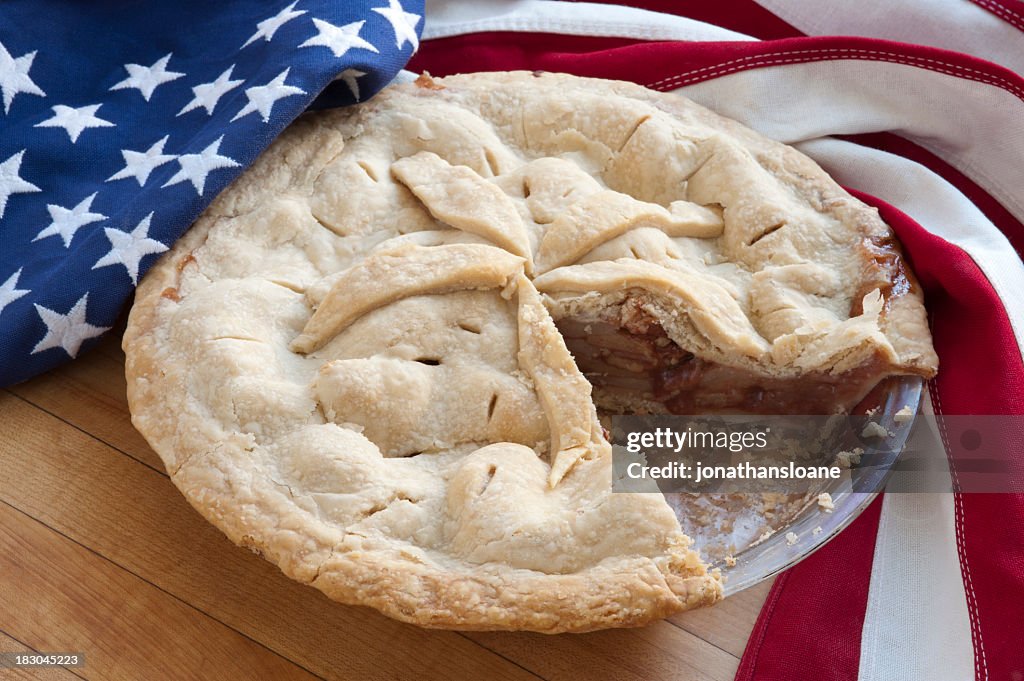 Apple pie on countertop with American flag