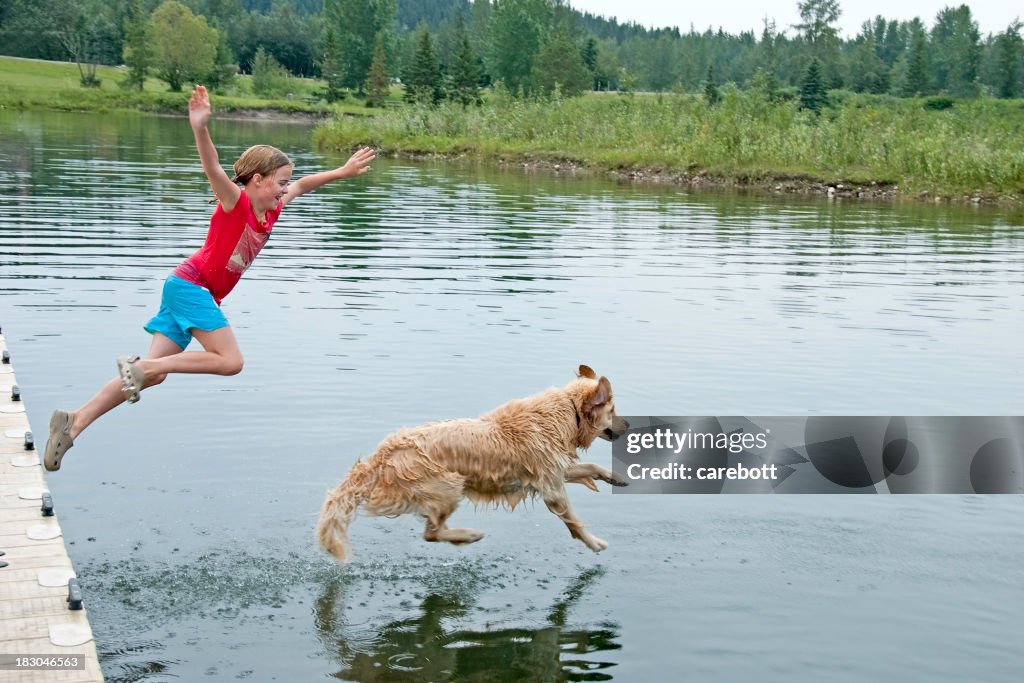 Girl Swimming With Her Dog