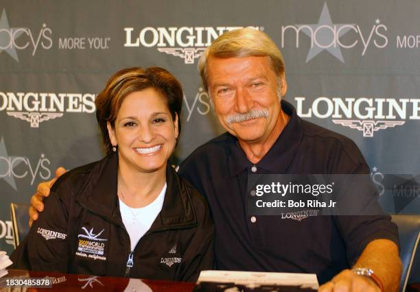 United States Olympian Mary Lou Retton with Olympic coach Bela Karolyi met with fans at the South Coast Plaza Mall, July 25, 2003 in Costa Mesa,...