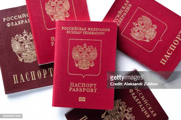 international and internal passports of a citizen of the russian federation. a ban on issuing schengen visas to russian tourists. travel ban. refusal to issue visas and residence permits. renunciation of citizenship. migration, emigration of russians. - schengen agreement stock pictures, royalty-free photos & images