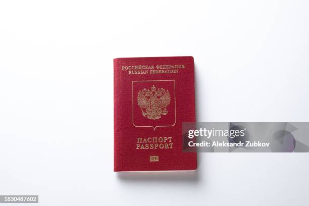 international and internal passports of a citizen of the russian federation. a ban on issuing schengen visas to russian tourists. travel ban. refusal to issue visas and residence permits. renunciation of citizenship. migration, emigration of russians. - schengen agreement stock pictures, royalty-free photos & images