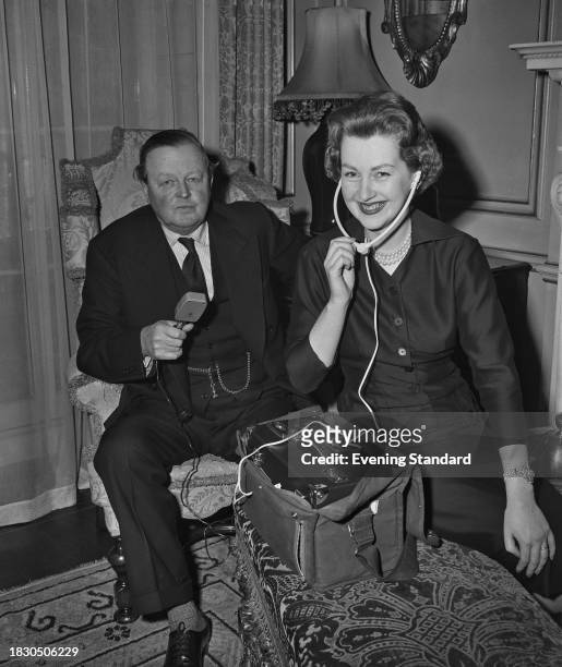 John Spencer-Churchill, 10th Duke of Marlborough , and Raine Legge , pictured with radio recording equipment, February 26th 1957.