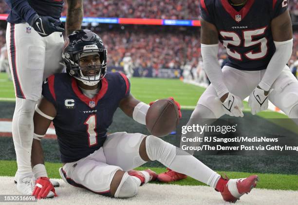 Houston Texans safety Jimmie Ward intercepts a pass from Denver Broncos quarterback Russell Wilson at the end of the game to stop a late game drive...