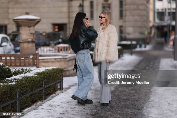 Anna Winter seen wearing Bottega Veneta white sunglasses, Acne Studios green leather cropped bomber jacket, Weekday light blue denim jeans / pants,...