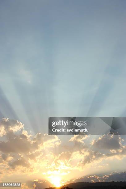 bright morning sun rays peeking over clouds - motivation background stock pictures, royalty-free photos & images