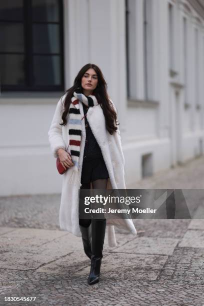 Celine Bethmann seen wearing Massimo Dutti black glitter boucle wool knit cardigan, Massimo Dutti black short skirt, Calzedonia black tights, Acne...