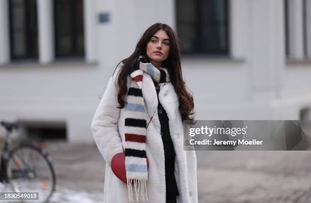 Celine Bethmann seen wearing Massimo Dutti black glitter boucle wool knit cardigan, Massimo Dutti black short skirt, Calzedonia black tights, Acne...