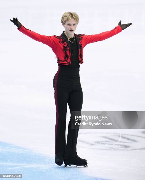 Ilia Malinin of the United States poses after performing in the men's short program at the Grand Prix Final figure skating competition in Beijing on...