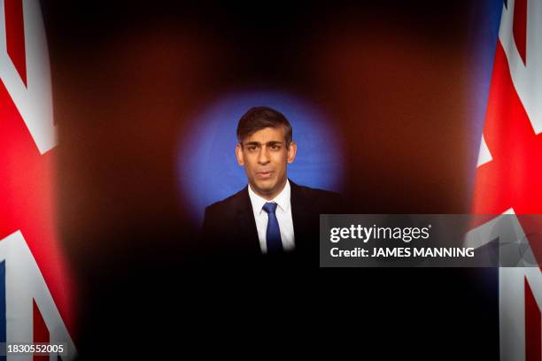 Britain's Prime Minister Rishi Sunak hosts a press conference inside the Downing Street Briefing Room, in central London, on December 7 after Britain...