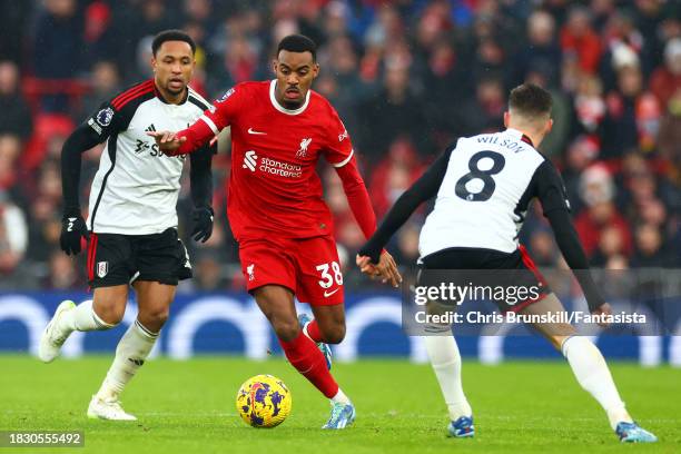 Ryan Gravenberch of Liverpool in action with Harry WIlso of Fulham during the Premier League match between Liverpool FC and Fulham FC at Anfield on...