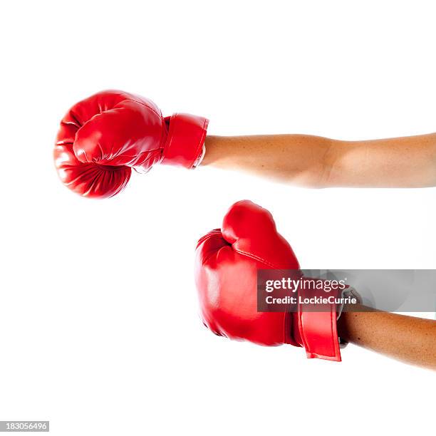 woman hands with boxing gloves on white background - boxing glove stock pictures, royalty-free photos & images