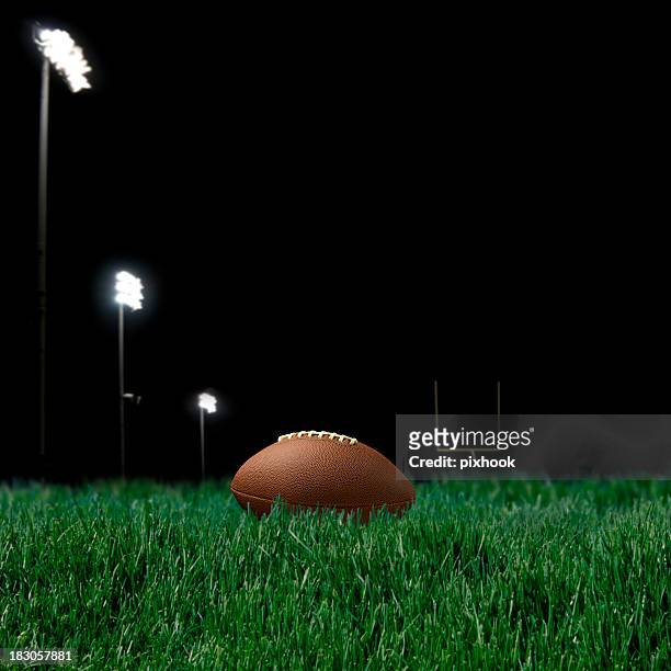 night game - football goal post stock pictures, royalty-free photos & images