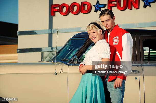 retro 50's couple standing near old car and diner - 1950 bildbanksfoton och bilder