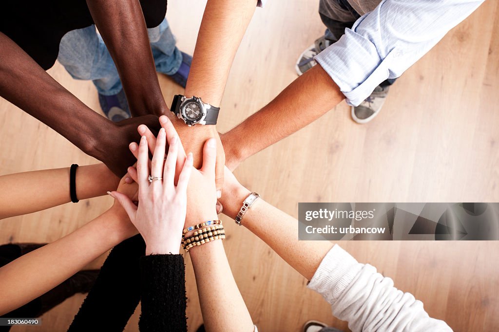 Group with hands together