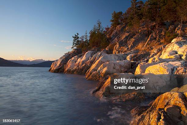rocky coastline - inlet stock pictures, royalty-free photos & images