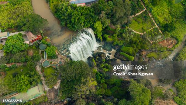 aerial view of thac voi - elephant waterfall, forest and city scene near dalat city and linh an pagoda in vietnam - dalat stock pictures, royalty-free photos & images