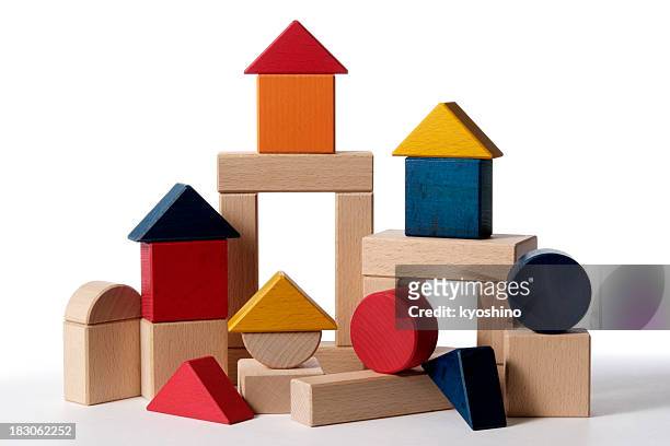 isolated shot of home building wood blocks on white background - toy block stock pictures, royalty-free photos & images