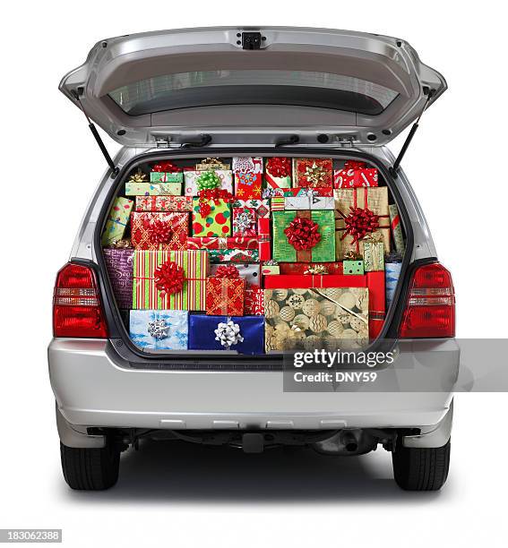 christmas presents stuffed into suv isolated on white background - bagagelucka bildbanksfoton och bilder
