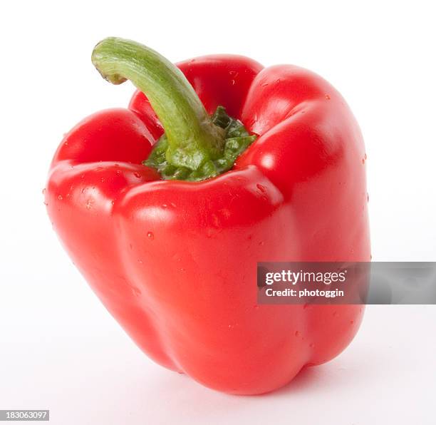 single red pepper isolated on white - red bell pepper stock pictures, royalty-free photos & images