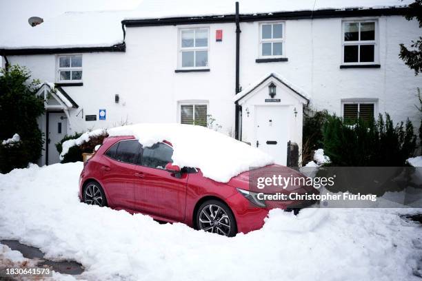 Heavy snow still lingers in the village of Ings, Cumbria on December 04, 2023 near Windermere, England. Following the weekend snow falls over 800...