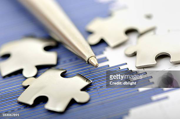 putting together puzzle pieces and facts to solve a problem - business plan abstract stock pictures, royalty-free photos & images