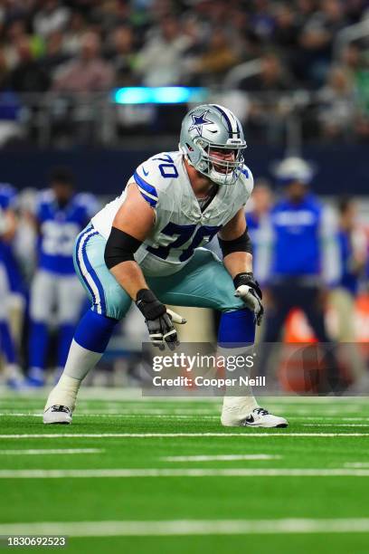 Zack Martin of the Dallas Cowboys lines up during an NFL football game against the Seattle Seahawks at AT&T Stadium on November 30, 2023 in...