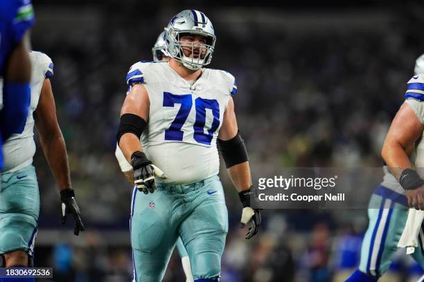 Zack Martin of the Dallas Cowboys looks on from the field during an NFL football game against the Seattle Seahawks at AT&T Stadium on November 30,...