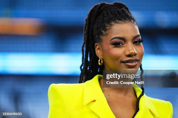 Tyler Rooks Style Taylor Rooks poses for a photo prior to an NFL football game between ...