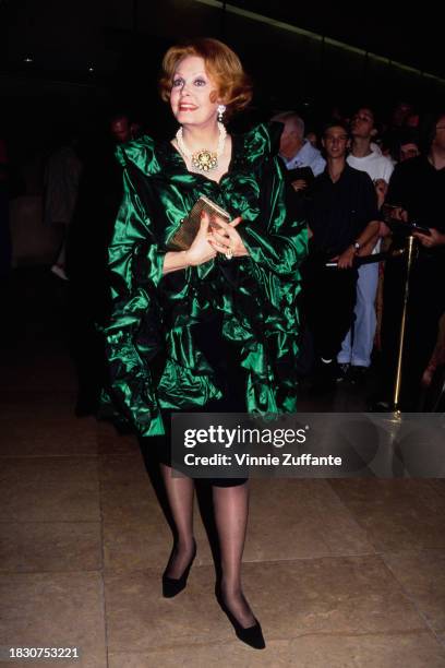 American actress Arlene Dahl wearing a black-and-green outfit, attends the launch party for the 1992 Deauville American Film Festival, in Deauville,...