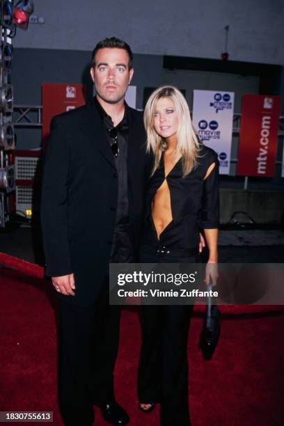 American television presenter Carson Daly and American actress Tara Reid attend the 2000 MTV Movie Awards, held at Sony Pictures Studios in Culver...