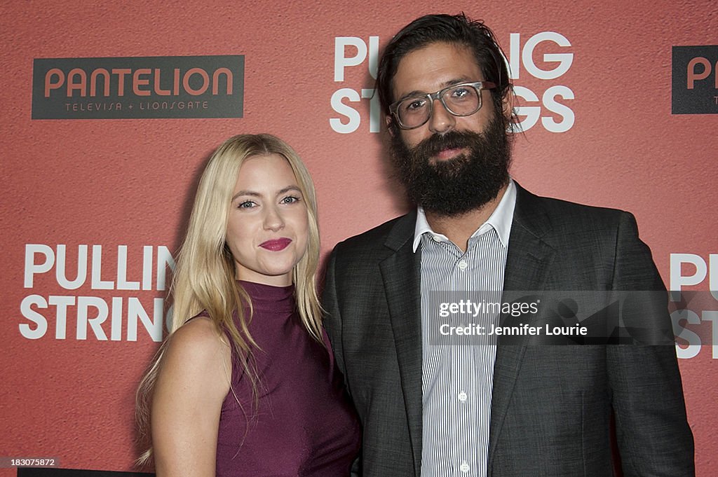 Actress Laura Ramsey and designer Greg Chait arrive at the Los... News ...