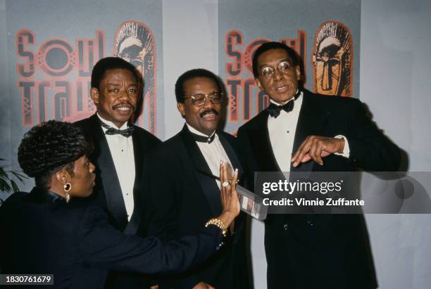 American lawyer Johnnie Cochran and American television show host Don Cornelius, both dressed in tuxedos and bow ties, attend the 9th Annual Soul...