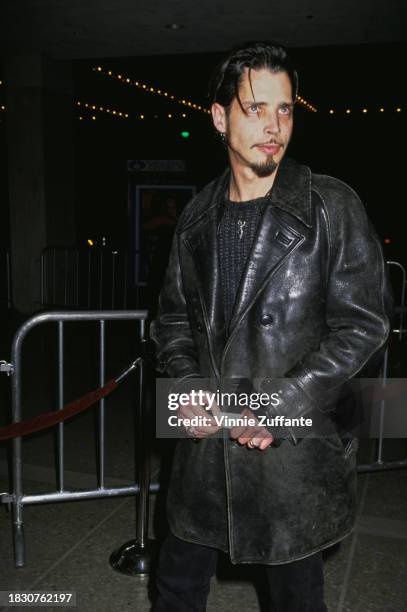 American singer, songwriter and musician Chris Cornell, wearing a black leather jacket, attends the Century City premiere of 'Great Expectations,'...